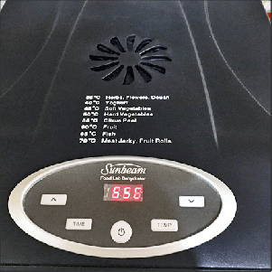 Food dehydrator control panel, close up.